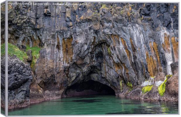 Carrickarede Caves Canvas Print by Peter Lennon