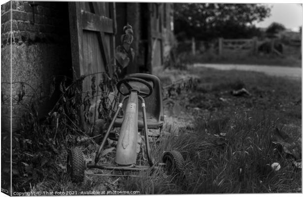 Old childs Gocart outside a deserted farm building Canvas Print by That Foto