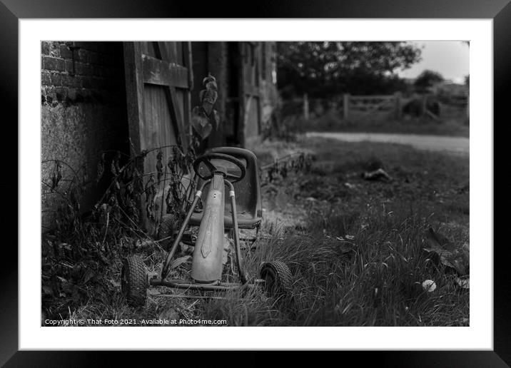 Old childs Gocart outside a deserted farm building Framed Mounted Print by That Foto