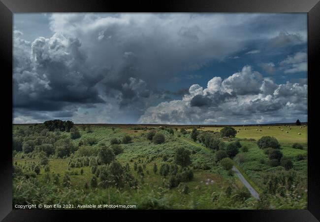Stormy Roman Road Through Yorkshire Moors Framed Print by Ron Ella