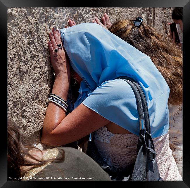 Woman pray at the western Wall A.K.A  "Kotel" or " Framed Print by Eyal Nahmias