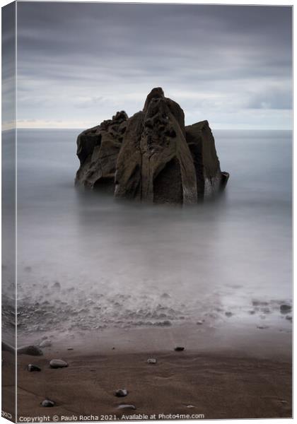 Long exposure seascape with a rock formation on the beach  Canvas Print by Paulo Rocha