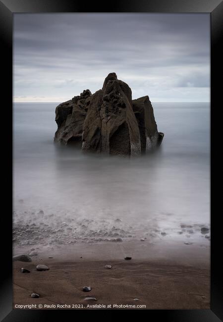 Long exposure seascape with a rock formation on the beach  Framed Print by Paulo Rocha