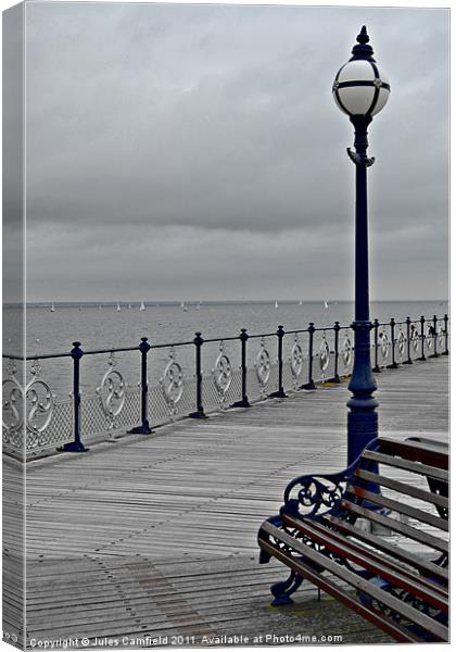 Post On The Pier Canvas Print by Jules Camfield