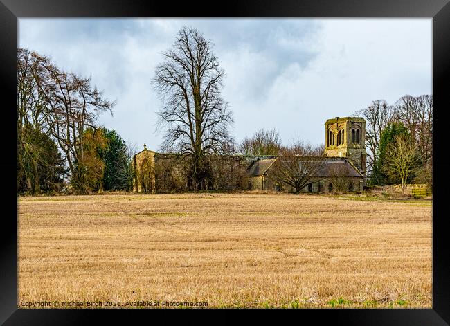 Basking in the glow of St Cuthberts Church Norham Framed Print by Michael Birch