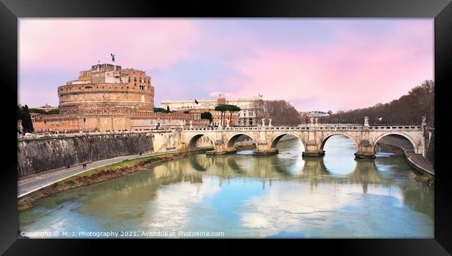 An Angel bridge over a body of water in Rome - Ita Framed Print by M. J. Photography