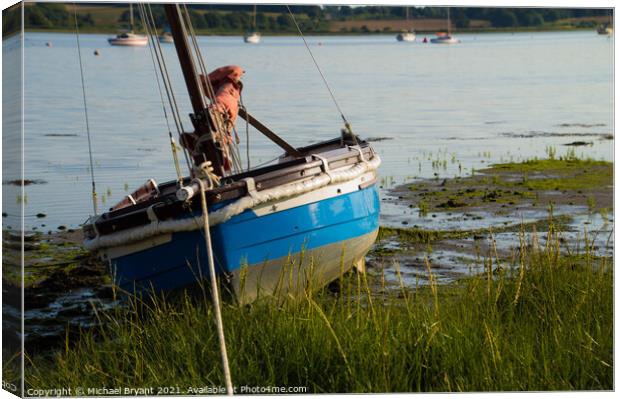 small boat at low tide manningtree essex Canvas Print by Michael bryant Tiptopimage