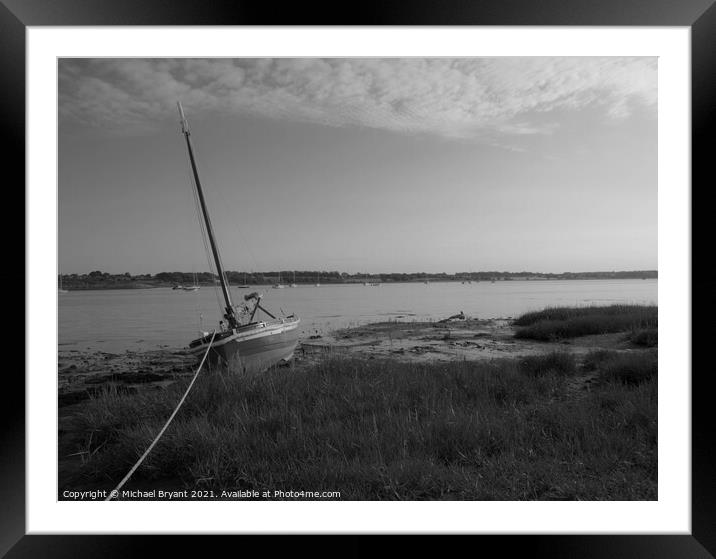 Small wooden boat at low tide Framed Mounted Print by Michael bryant Tiptopimage