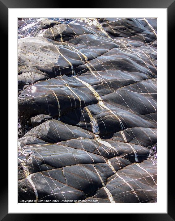 Glistening sea-washed rocks Framed Mounted Print by Cliff Kinch
