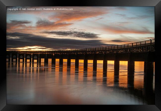 Sunset over the Tay Rail Bridge Dundee Scotland Framed Print by Iain Gordon