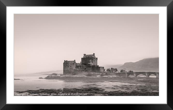 Eilean Donan Castle in vintage black and white  Framed Mounted Print by Anthony McGeever