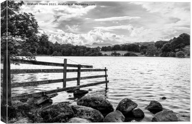 Old fence at Loughrigg Tarn monochrome Canvas Print by Graham Moore