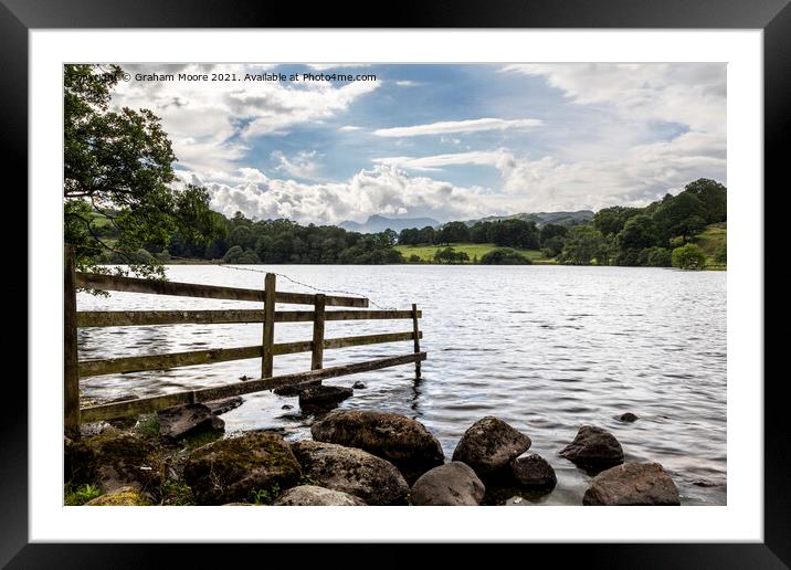 Old fence at Loughrigg Tarn Framed Mounted Print by Graham Moore