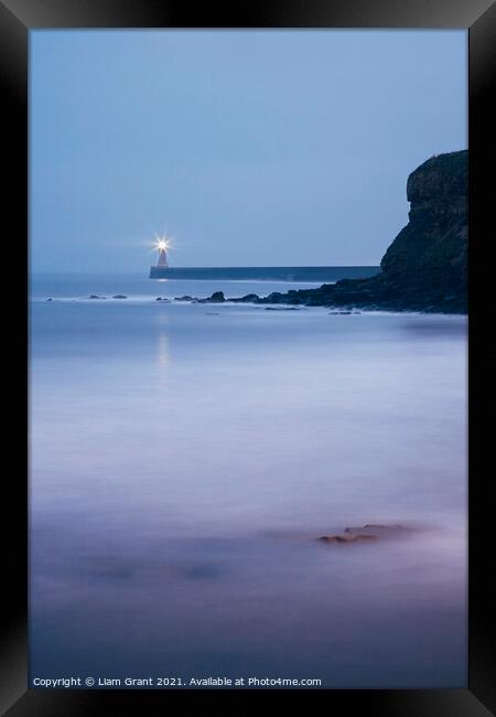 Lighthouse and breaking waves at dusk twilight. Tynemouth, North Framed Print by Liam Grant