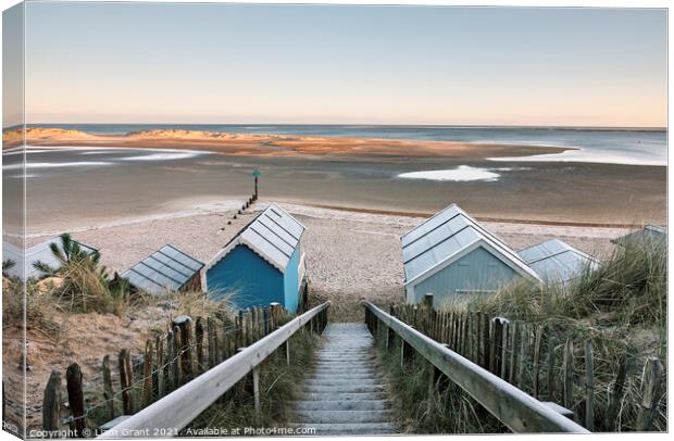 Frost covered beach huts on a winter's morning. Wells-next-the-sea, Norfolk, UK. Canvas Print by Liam Grant