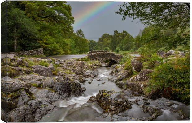 Rainbow at Ashness Bridge Canvas Print by Roger Green