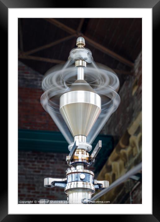 Spinning steam engine governor Framed Mounted Print by Heather Sheldrick