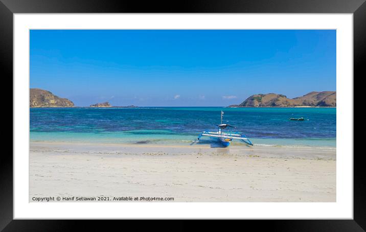Paradise lagoon beach with boat at Tanjung An. Framed Mounted Print by Hanif Setiawan