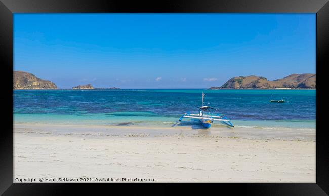 Paradise lagoon beach with boat at Tanjung An. Framed Print by Hanif Setiawan