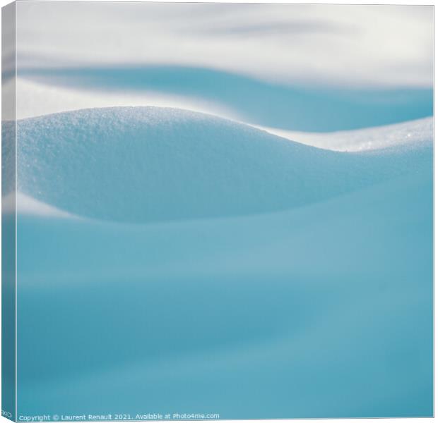 Snow curves in blue background Canvas Print by Laurent Renault