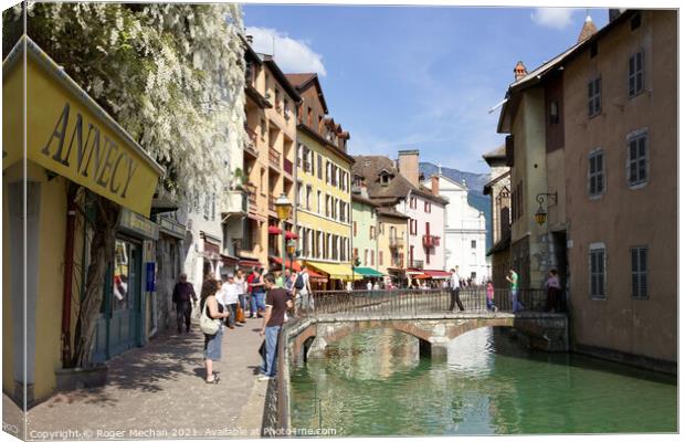 A Romantic Stroll in Annecy Canvas Print by Roger Mechan