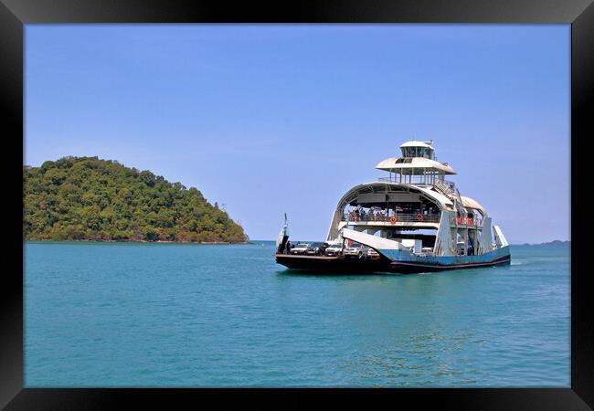 ferry boat or ship of the Thai Island Koh Chang Thailand Southeast Asia Framed Print by Wilfried Strang