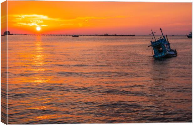 an old ship at the sea  during the sunset time Canvas Print by Wilfried Strang