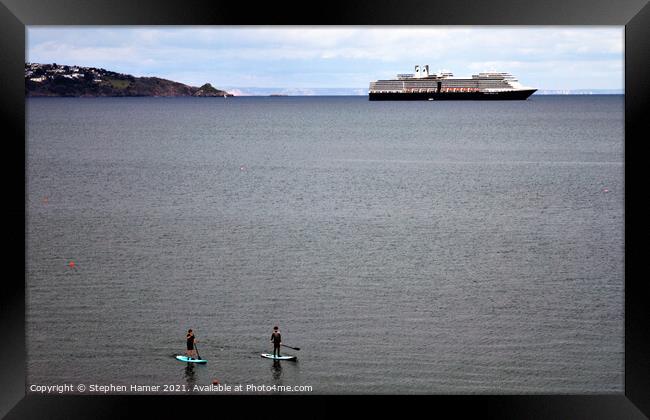 Paddle Boarders and Cruise Ship Framed Print by Stephen Hamer