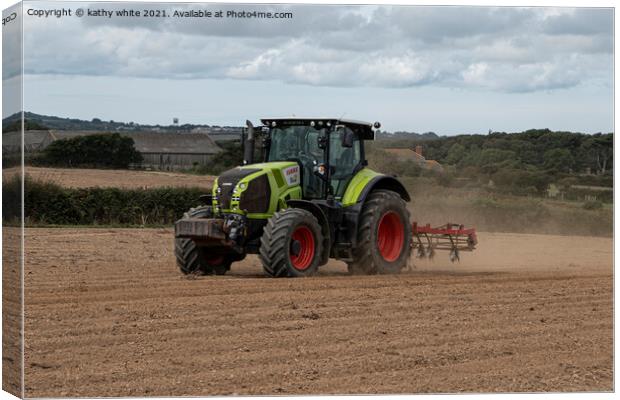 Tractor  in a Cornish field Canvas Print by kathy white