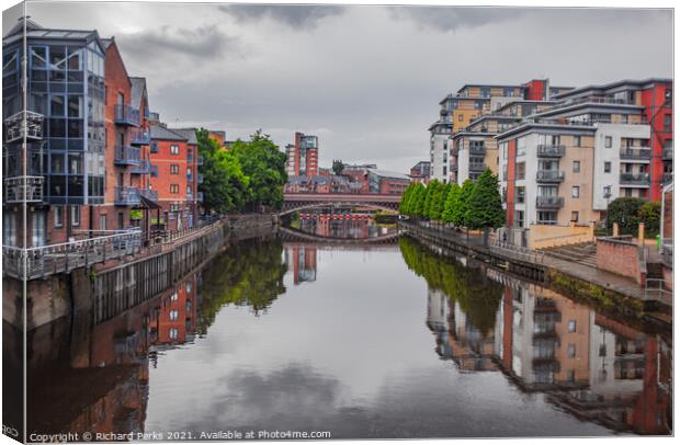 River Aire Leeds City centre reflections Canvas Print by Richard Perks