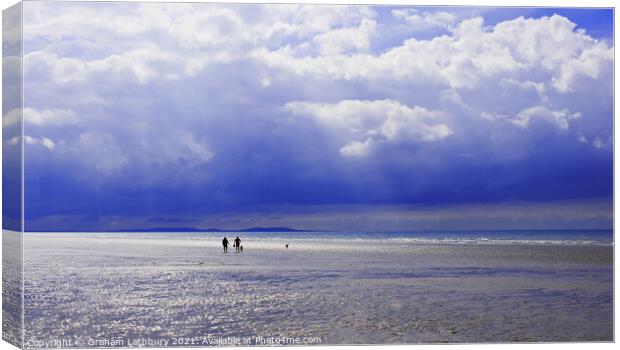Lone Couple on Pendine Sands Canvas Print by Graham Lathbury