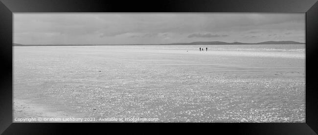 Lone Walkers on Pendine Sands Framed Print by Graham Lathbury