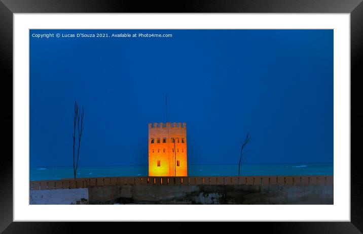 Illuminated watch tower Framed Mounted Print by Lucas D'Souza