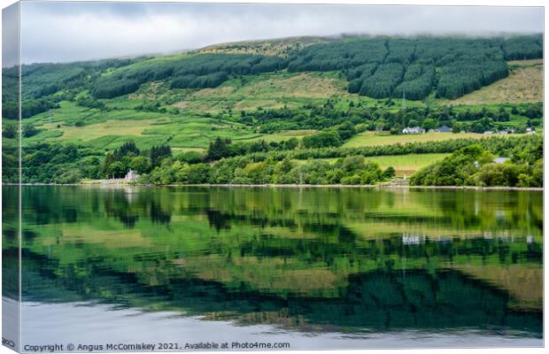 Reflections on Loch Tay, Perthshire Canvas Print by Angus McComiskey