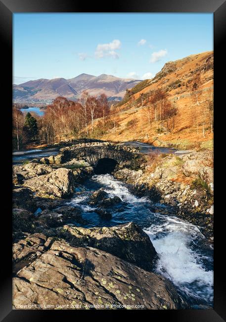 Ashness Bridge with Skiddaw beyond. Framed Print by Liam Grant