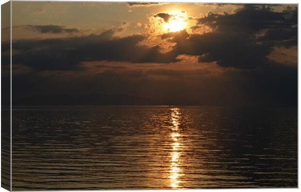 Arran silhouetted in moody sunset sky Canvas Print by Allan Durward Photography