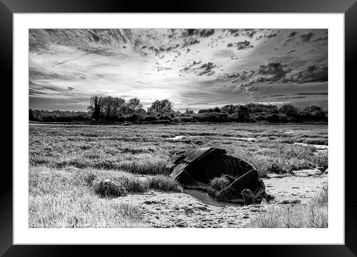 monochrome Medway boat wreck Framed Mounted Print by Robert Deering
