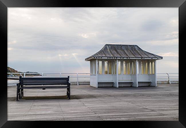 Bench and shelter on Cromer Pier Framed Print by Jason Wells