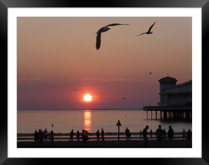 Sun setting over Weston Super Mare Framed Mounted Print by Charlotte Noble
