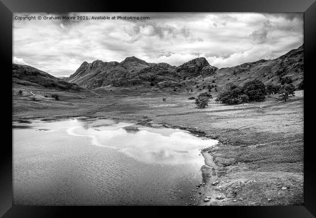 Blea Tarn the Langdale Pikes and Side Pike monochrome Framed Print by Graham Moore