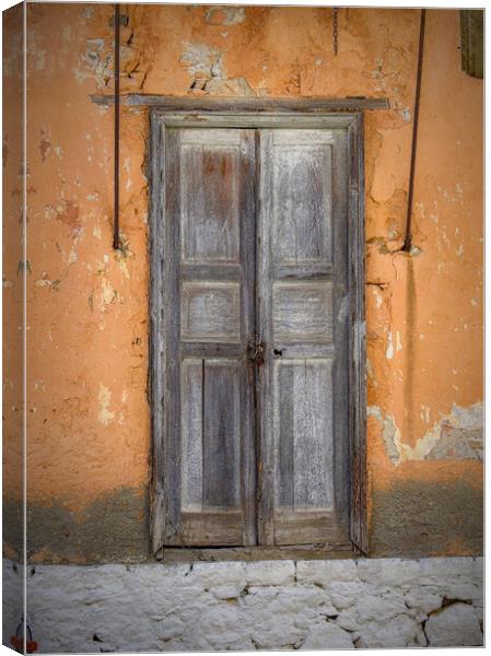Halki Greek Island Weathered Door Canvas Print by Antony McAulay
