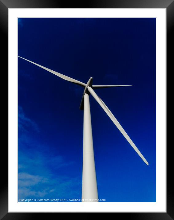 A windmill with a clear blue sky  Framed Mounted Print by Paddy 