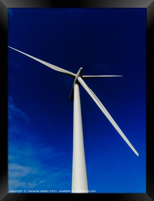 A windmill with a clear blue sky  Framed Print by Paddy 