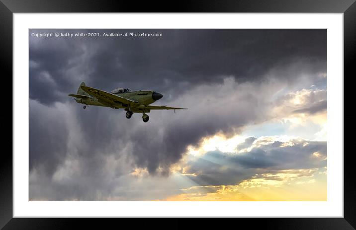 Spitfire, flying into the light Framed Mounted Print by kathy white
