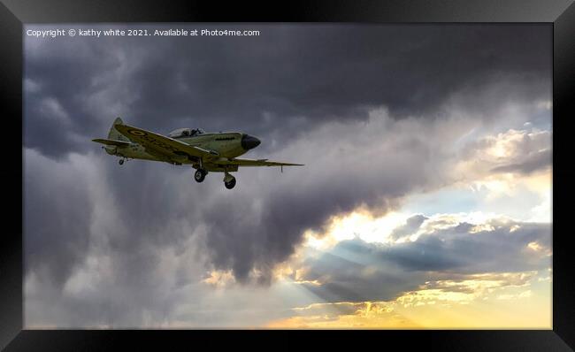 Spitfire, flying into the light Framed Print by kathy white