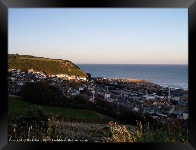 Hastings Seafront and Old Town as the Sun goes down. Framed Print by Mark Ward
