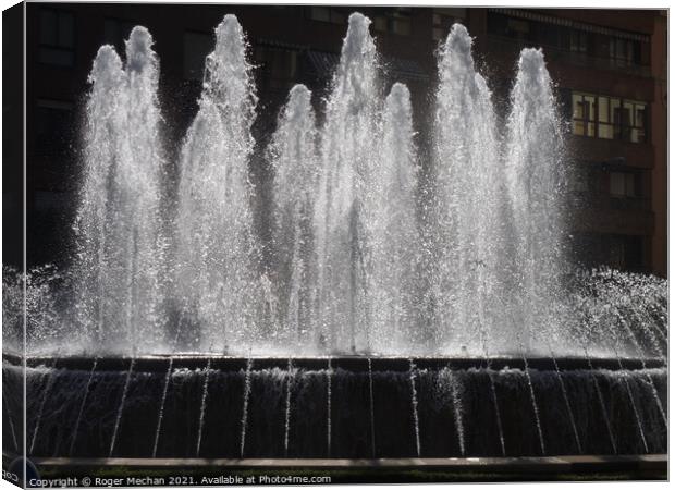 The Beauty of Leon's Sprinkler Fountain Canvas Print by Roger Mechan