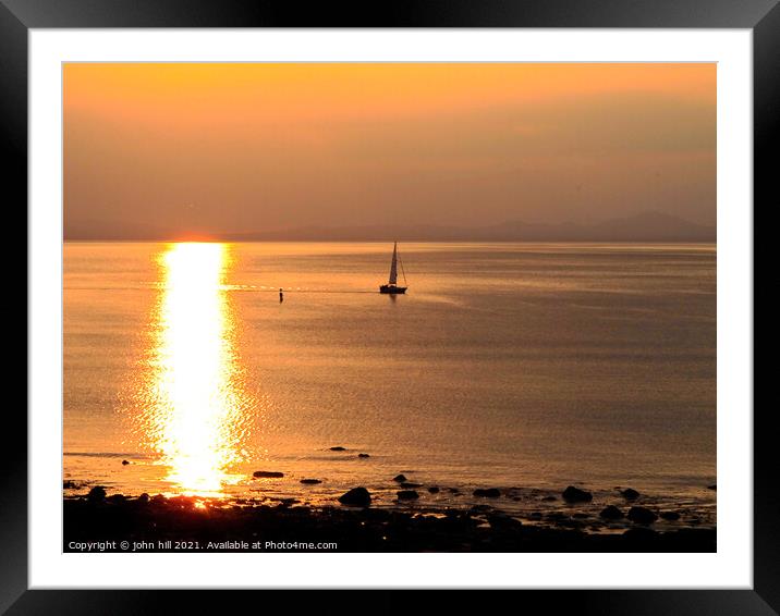 Lone Yacht in the sunset. Framed Mounted Print by john hill