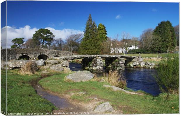 Crossing the Clapper Bridge Canvas Print by Roger Mechan