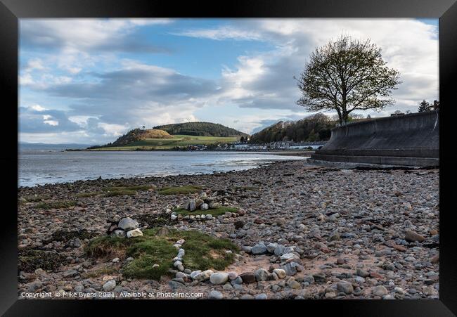 A rocky beach on the Black Isle Framed Print by Mike Byers